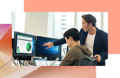 two man discussing with desktop