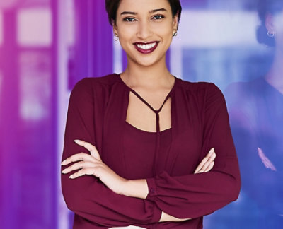 A woman with her arms crossed.