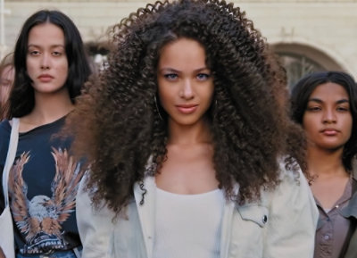 The three women models posing for camera.