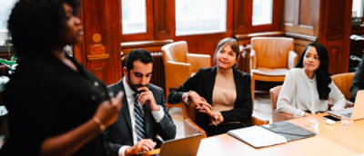 A group people in conference room and discussing