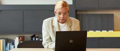 A women working on laptop.