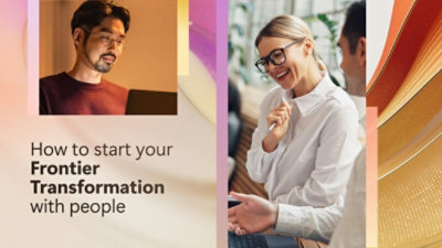 A man and woman smiling and looking at each other near a white sign with black text that reads, How to start your Frontier Transformation with people.