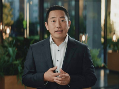 A man wearing blazer looking at the camera
