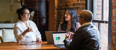 A group of people sitting at a table.