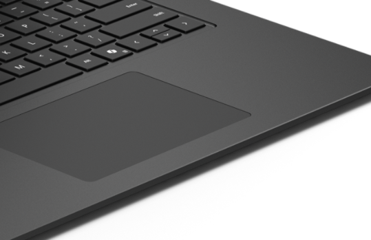 Un primer plano del panel táctil y del teclado en un Surface Laptop para empresas .