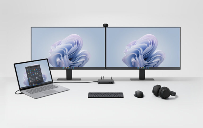 A desktop setup shows Surface Thunderbolt 4 Dock for Business connected to other Surface devices and accessories. 
