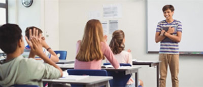 A group of students sitting at desks.